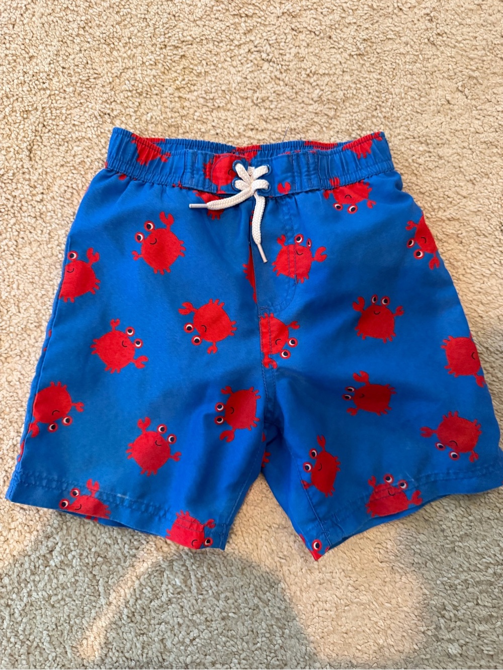 Little Me Blue Swim Trunks with Red Crab Print